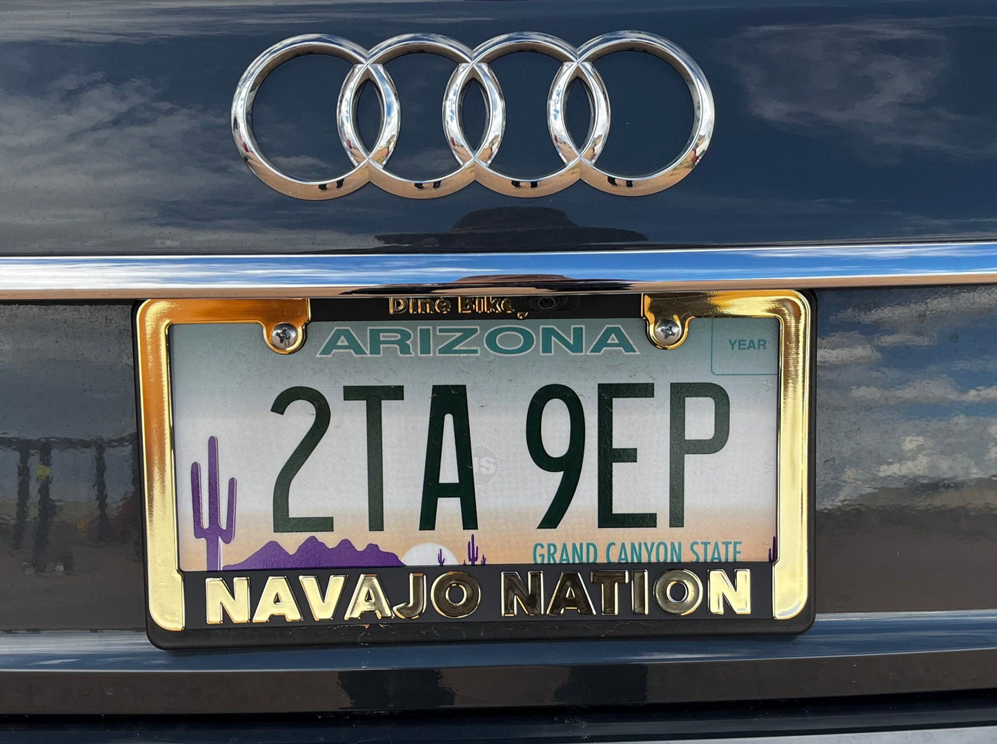 Navajo License Plate Frame (Gold-Black text)